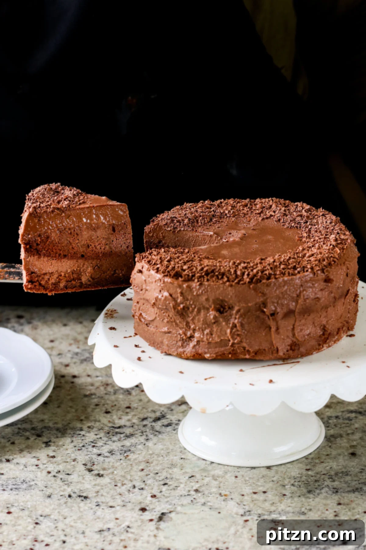 Decadent Vegan Mocha Cake with Velvety Chocolate Mousse (Gluten-Free Option) 5 serving a slice of vegan mocha cake