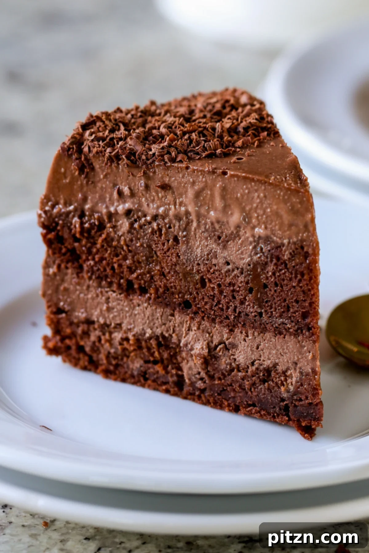 Decadent Vegan Mocha Cake with Velvety Chocolate Mousse (Gluten-Free Option) 6 slice of mocha mousse cake on a white plate