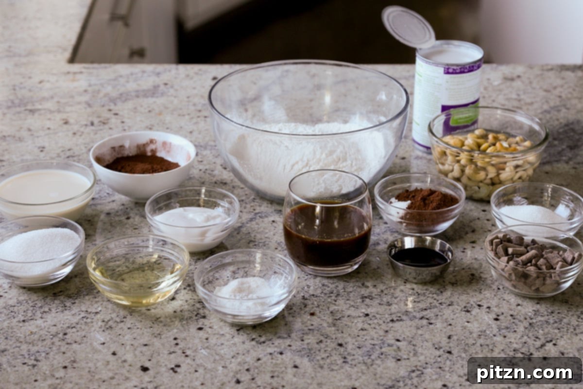 Decadent Vegan Mocha Cake with Velvety Chocolate Mousse (Gluten-Free Option) 7 vegan mocha cake ingredients in bowls on the kitchen counter