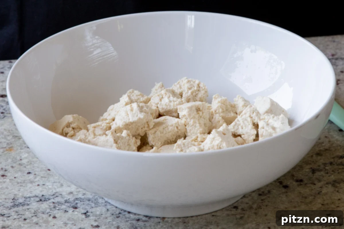 South Indian Black Pepper Tofu Fry 7 Torn up tofu pieces in a bowl, ready for seasoning
