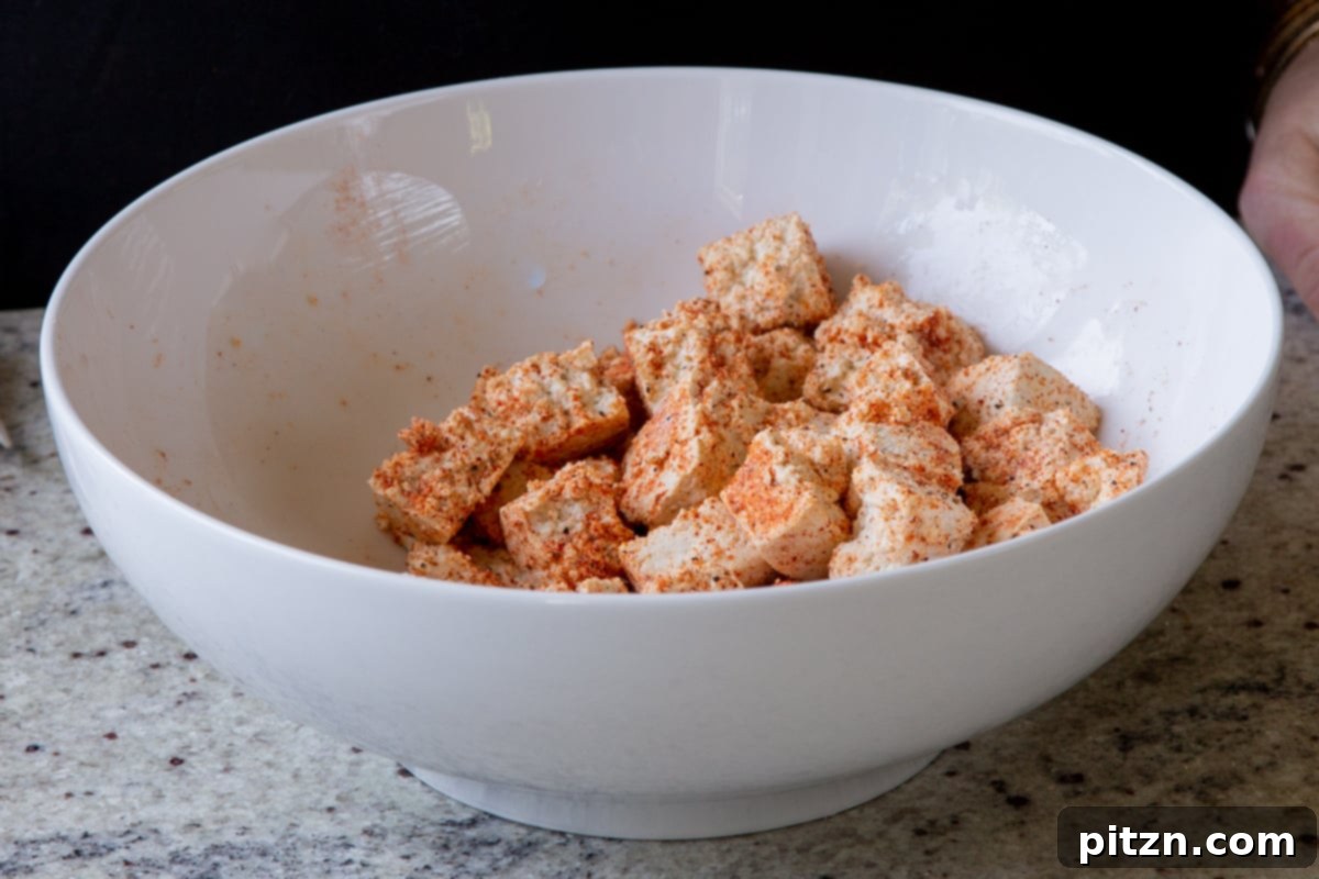 South Indian Black Pepper Tofu Fry 9 Tofu tossed with spices and cornstarch, ready for cooking