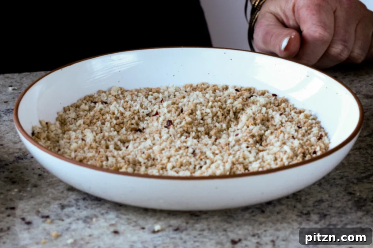 The Inclusive Crispy Vegan Chicken Sandwich 13 seasoned panko breadcrumbs in a bowl