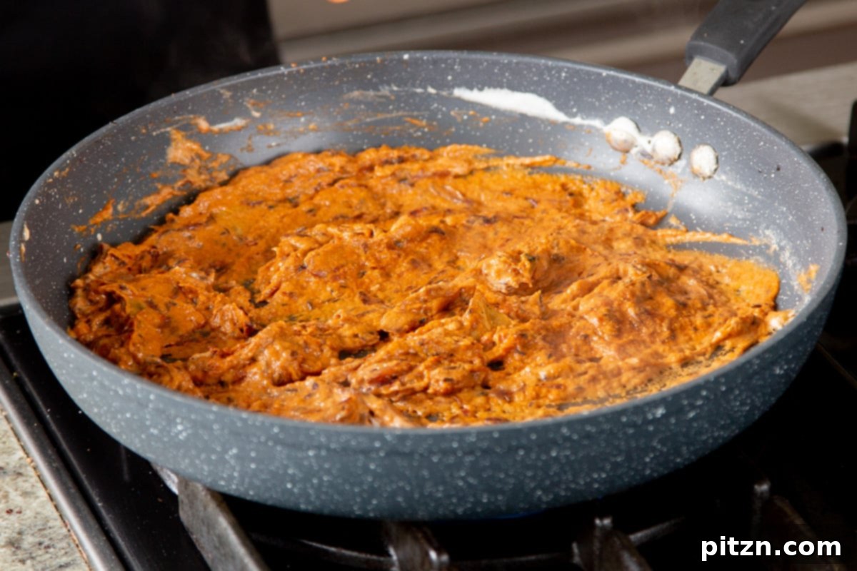 One Pot White Bean Do Pyaza Curry 14 The thick, aromatic Do Pyaza sauce in the pan before being thinned with water or non-dairy milk.