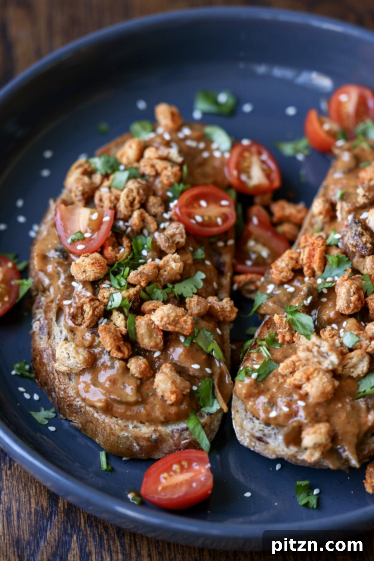 balchao mushrooms served on toast with crispy beans and tomatoes