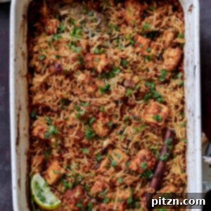 Lucknowi Biryani with crispy tofu and rice in a baking pan