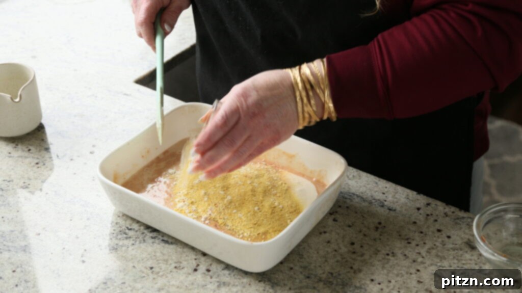 Creamy Smoky Vegan Mac and Cheese Bake 10 adding flour, nutritional yeast, and spices to the cheese sauce