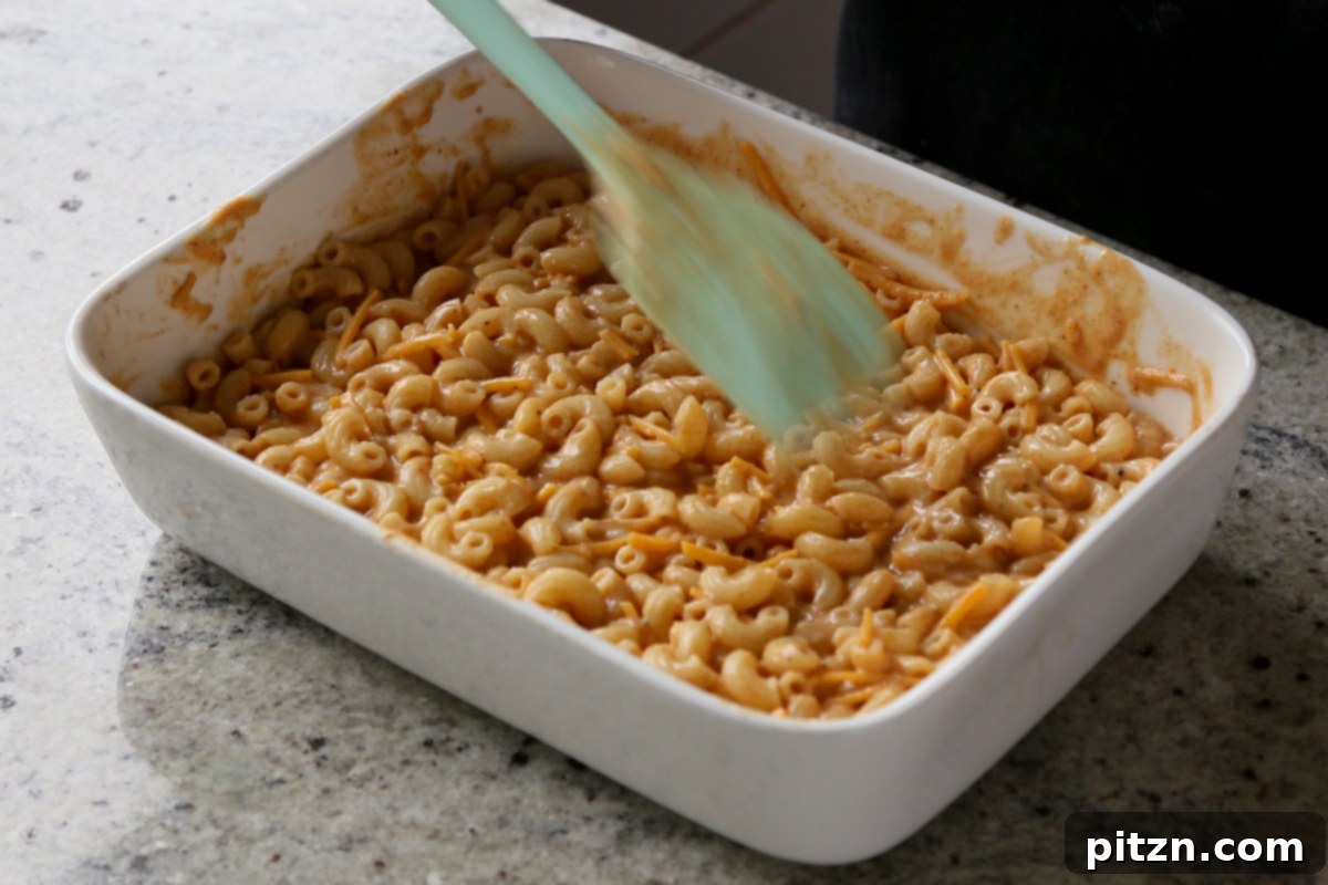 Creamy Smoky Vegan Mac and Cheese Bake 14 evening out the top of the macaroni