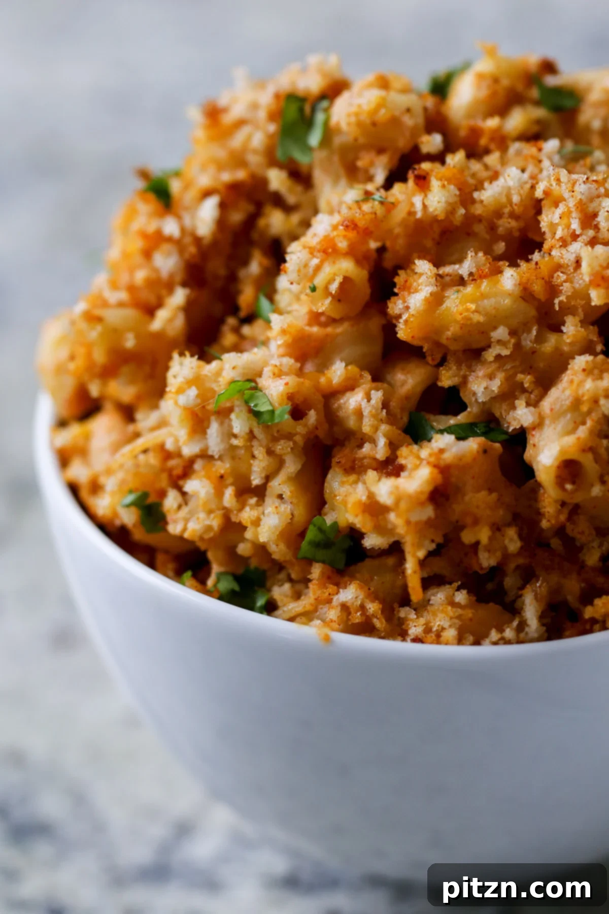Creamy Smoky Vegan Mac and Cheese Bake 5 close-up of a bowl of smoky vegan mac and cheese