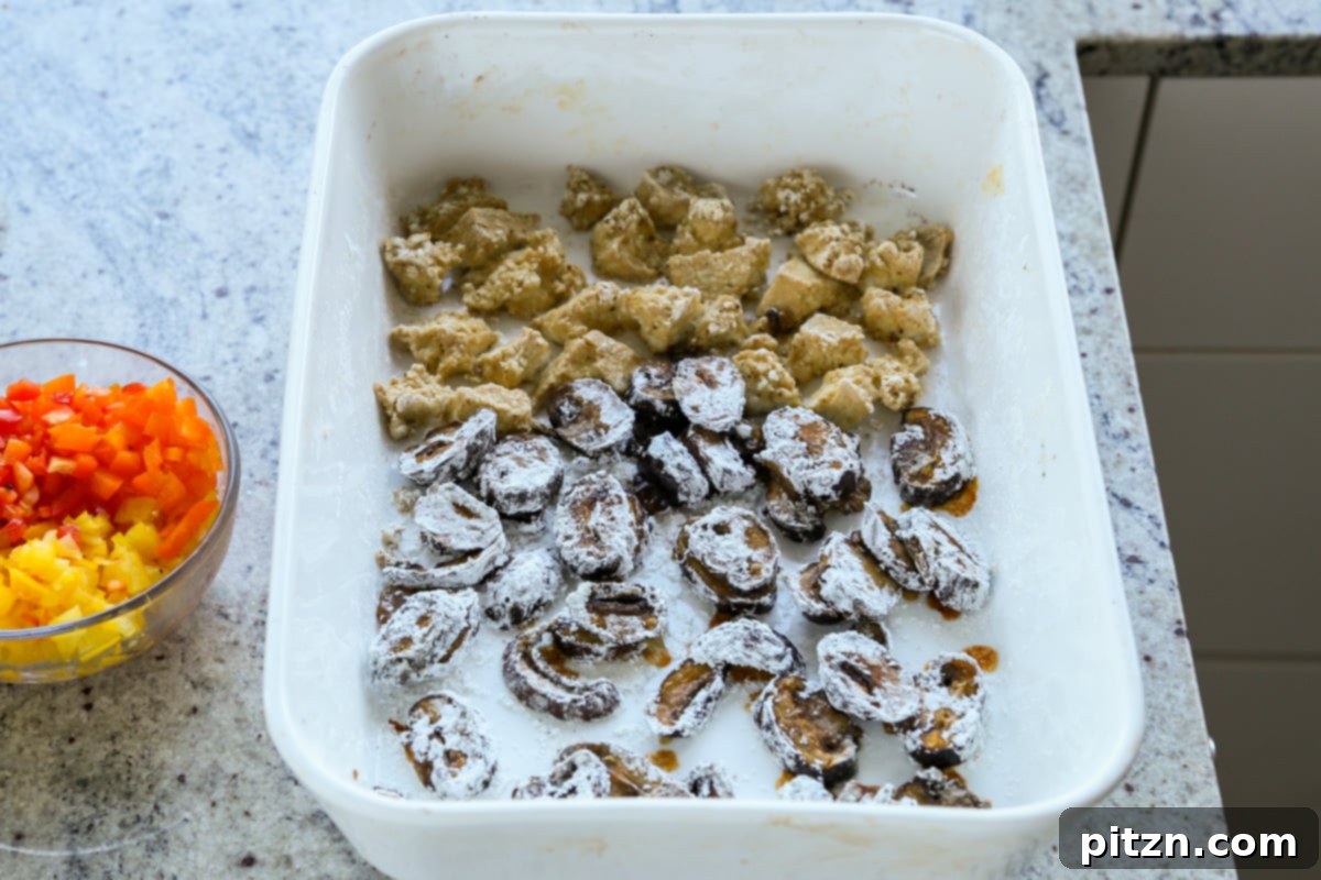 mushrooms and tofu after tossing in the sesame oil and the cornstarch mixture and baking