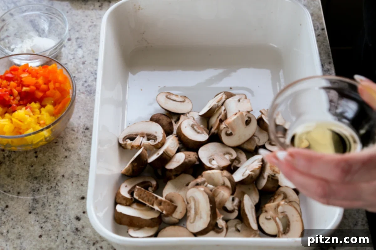 adding oil to the mushrooms