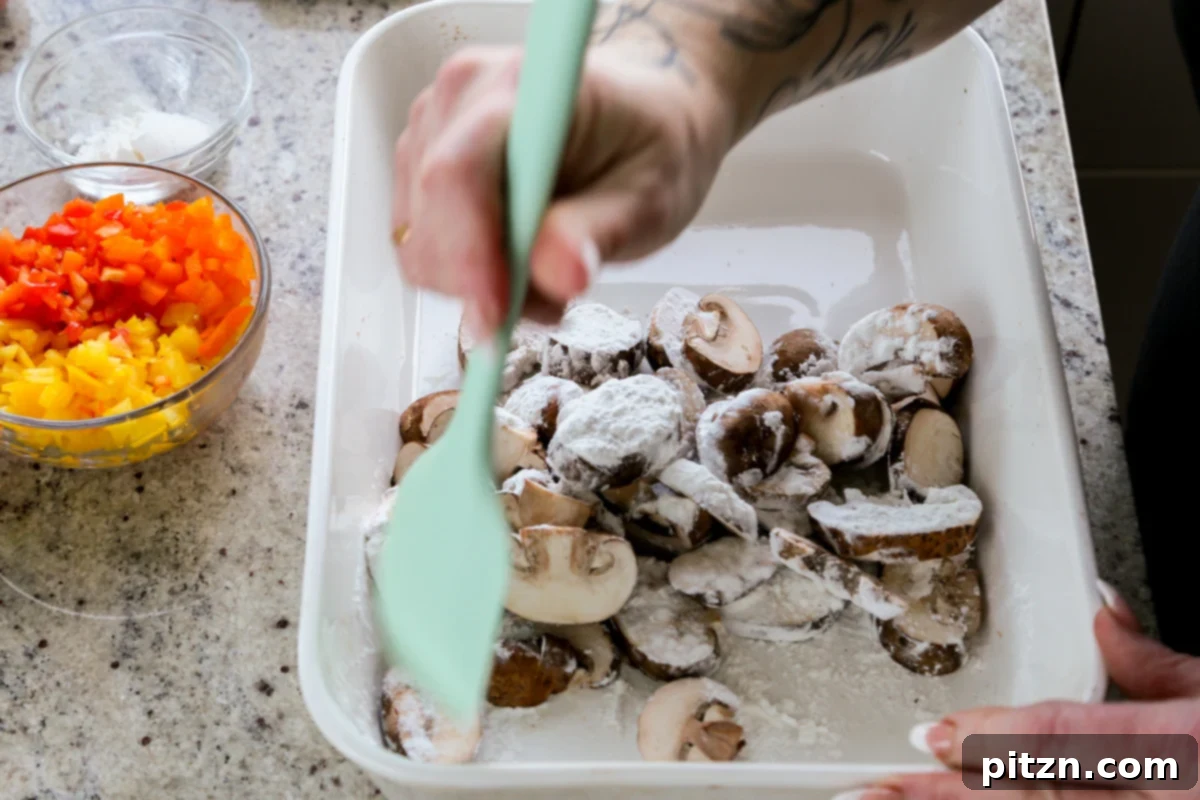 adding cornstarch mixture to the mushrooms