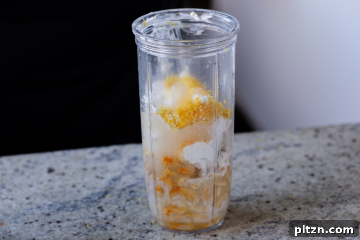 Zesty Vegan Lemon Cloud Cake 16 All frosting ingredients loaded into the blender, pre-blending