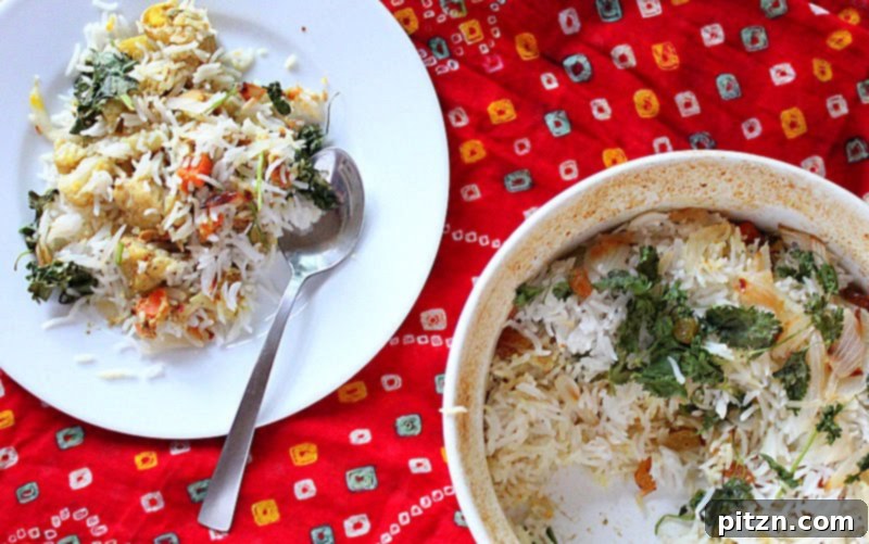 Effortless Vegan Biryani 3 Close-up of fluffy, aromatic Basmati rice with whole spices, ready for layering in a biryani