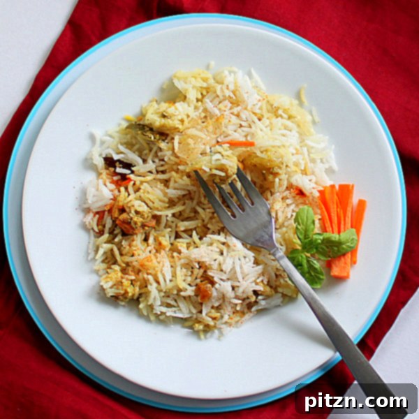 Effortless Vegan Biryani 5 A serving of flavorful vegan biryani with fresh cilantro garnish, ready to be enjoyed