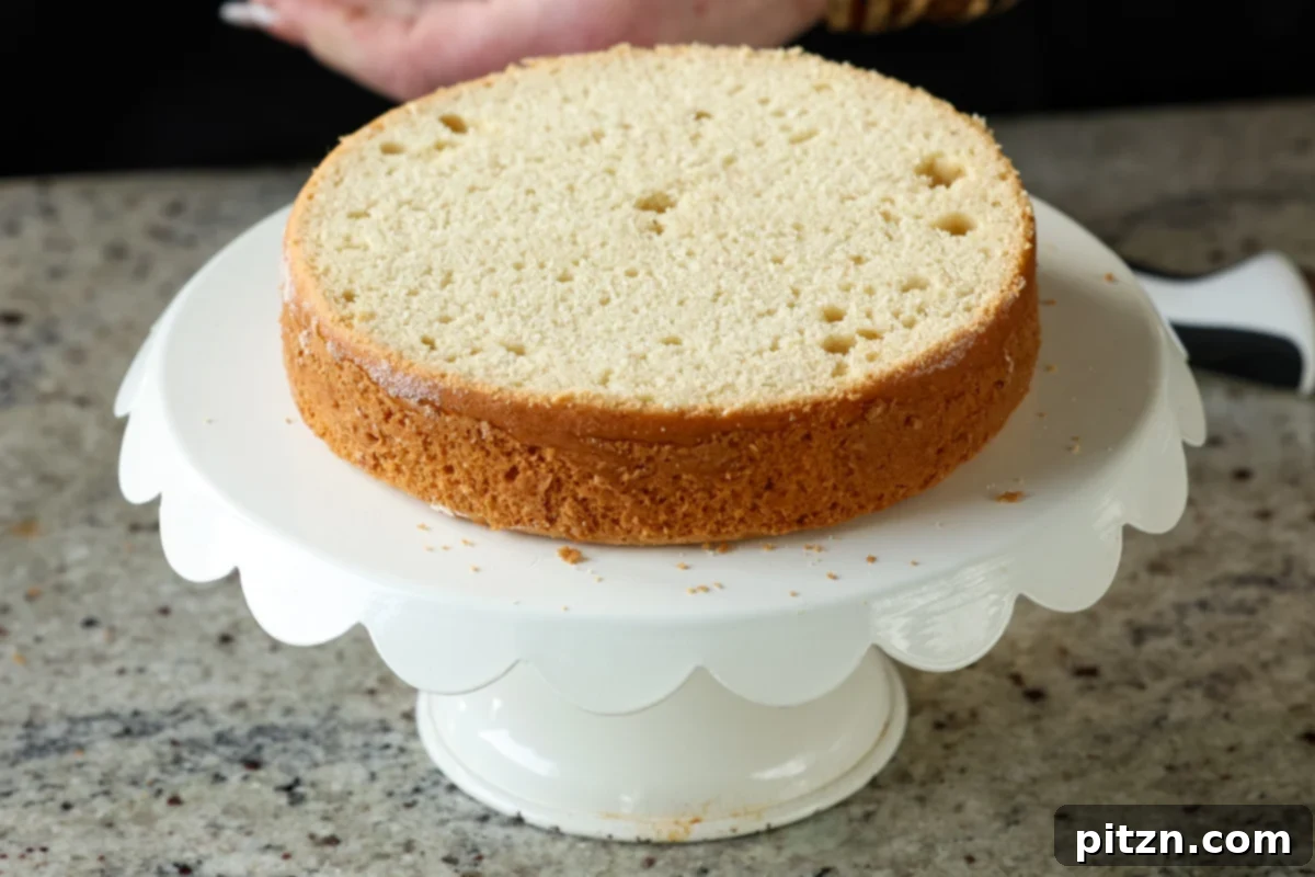 Vegan Strawberry Mousse Cake Gluten Free 21 The cake with its top neatly sliced off, ready for layering