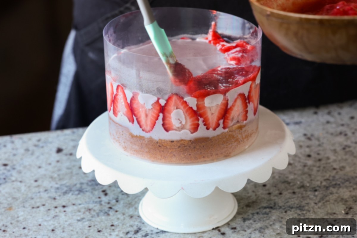 Vegan Strawberry Mousse Cake Gluten Free 26 Spreading the final layer of strawberry compote over the set mousse