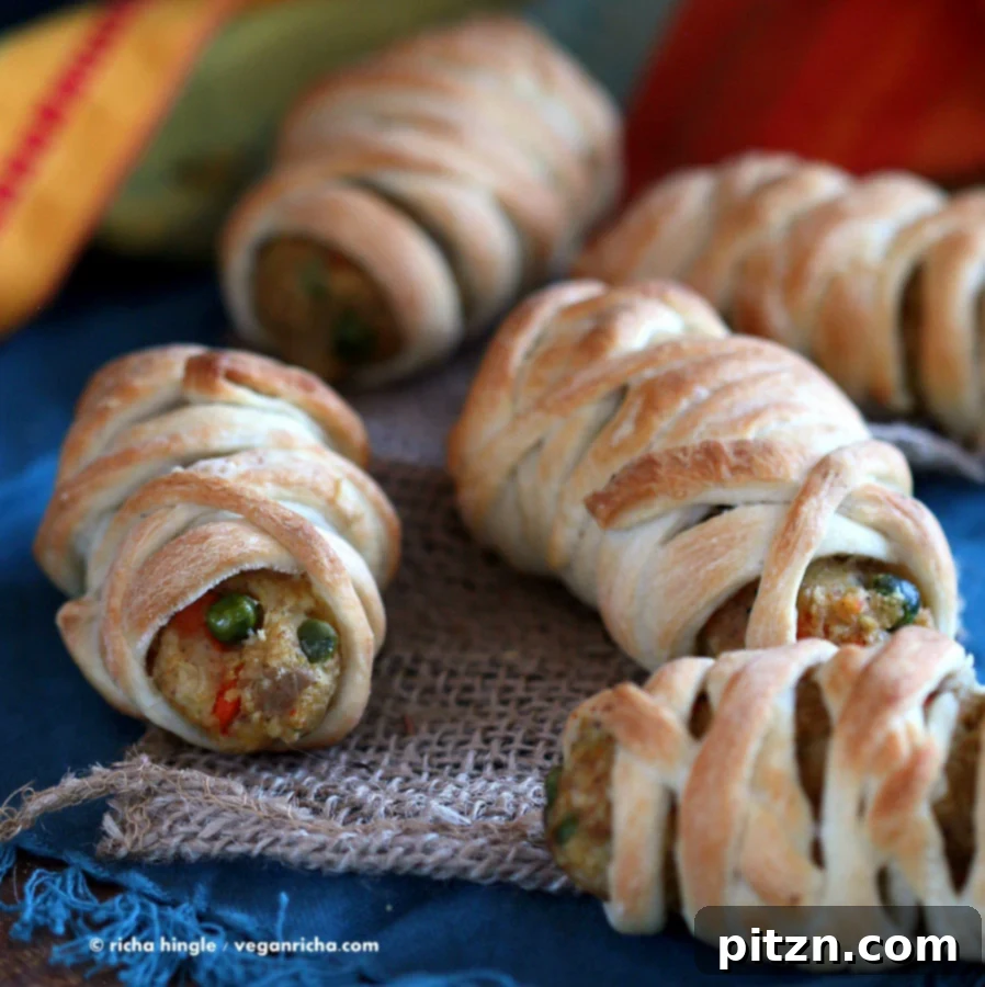 Vegan Bites Spooky Mummy Dogs and Spicy Masala Cutlets 3 Close-up of baked Vegan Mummy Dogs, perfect for Halloween treats
