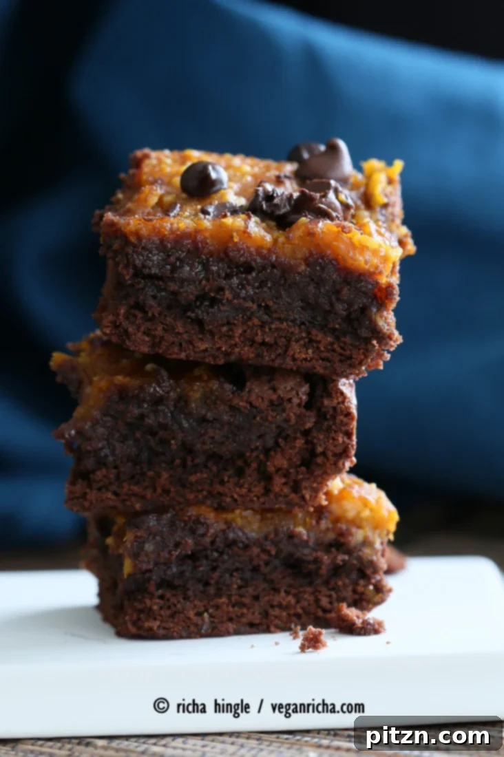 Vegan Pumpkin Pie Brownies 5 Plate of sliced Vegan Pumpkin Brownies, featuring a clear view of the two delicious layers, ready to be enjoyed. | Vegan Richa