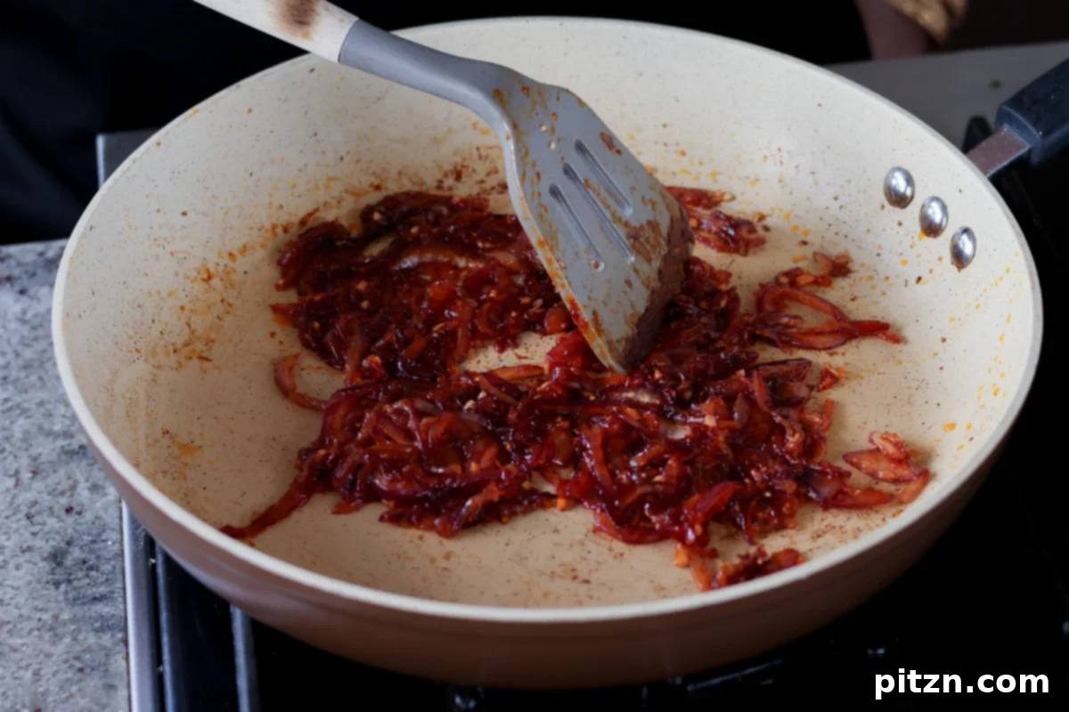 Gochujang Chickpea Sandwich with Sweet and Spicy Caramelized Onions 10 gochujang onions in the pan after cooking