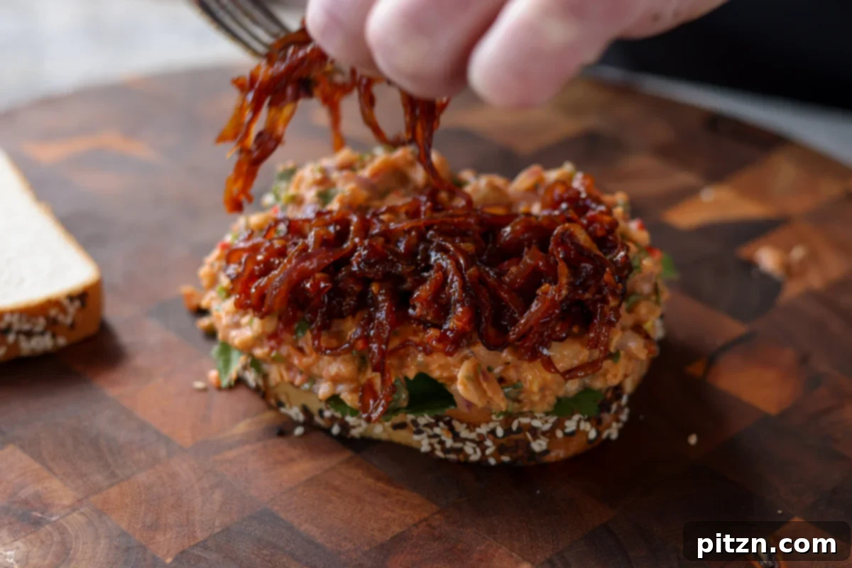 Gochujang Chickpea Sandwich with Sweet and Spicy Caramelized Onions 20 topping the gochujang chickpea salad with caramelized onion