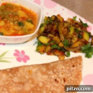 Mixed Vegetable Bhaji, a vibrant and healthy Indian vegetable stew, served as part of a vegan meal.
