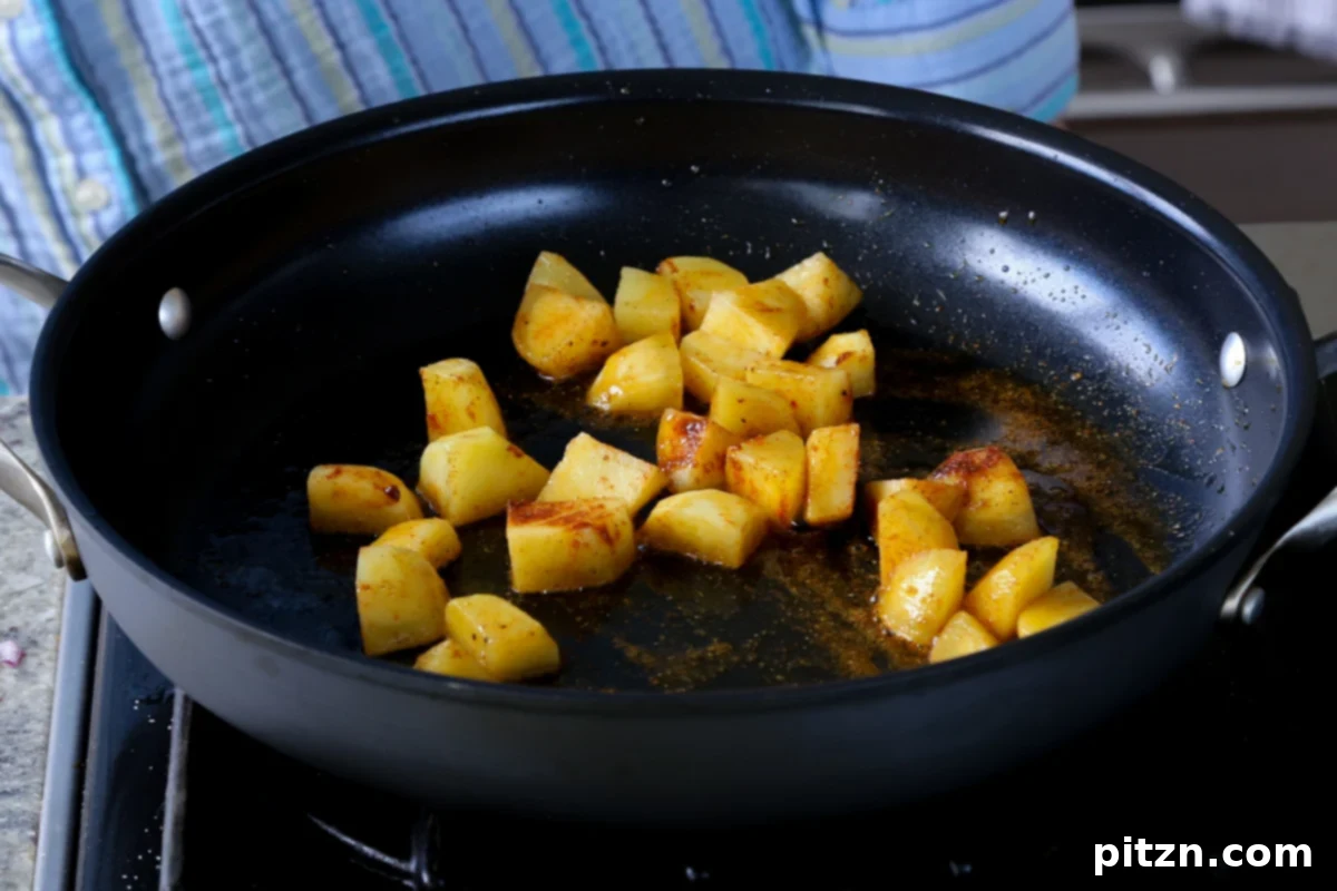 Robust Vindaloo Potato and Lentil Curry 11 potatoes in the pan after cooking