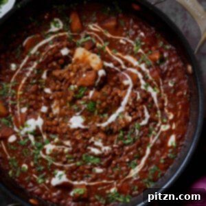 Robust Vindaloo Potato and Lentil Curry 6 lentils vindaloo in the pan after adding the toppings