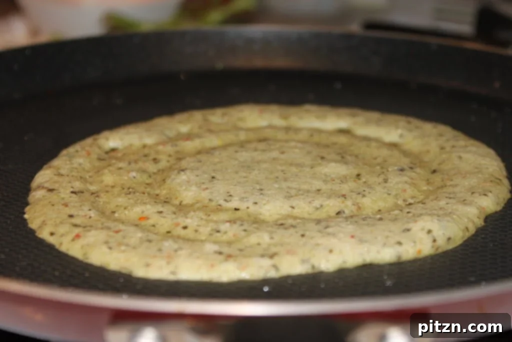 Crispy Dosa made from multi-lentil batter, golden brown and perfectly cooked on a griddle, ready for a healthy meal.