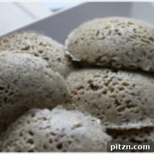 Multi Grain Idli served in a white dish