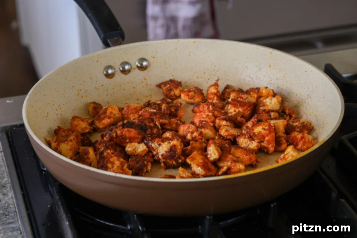 30-Minute Harissa Tofu Bowls for All Diets 13 harissa tofu in the pan, after cooking