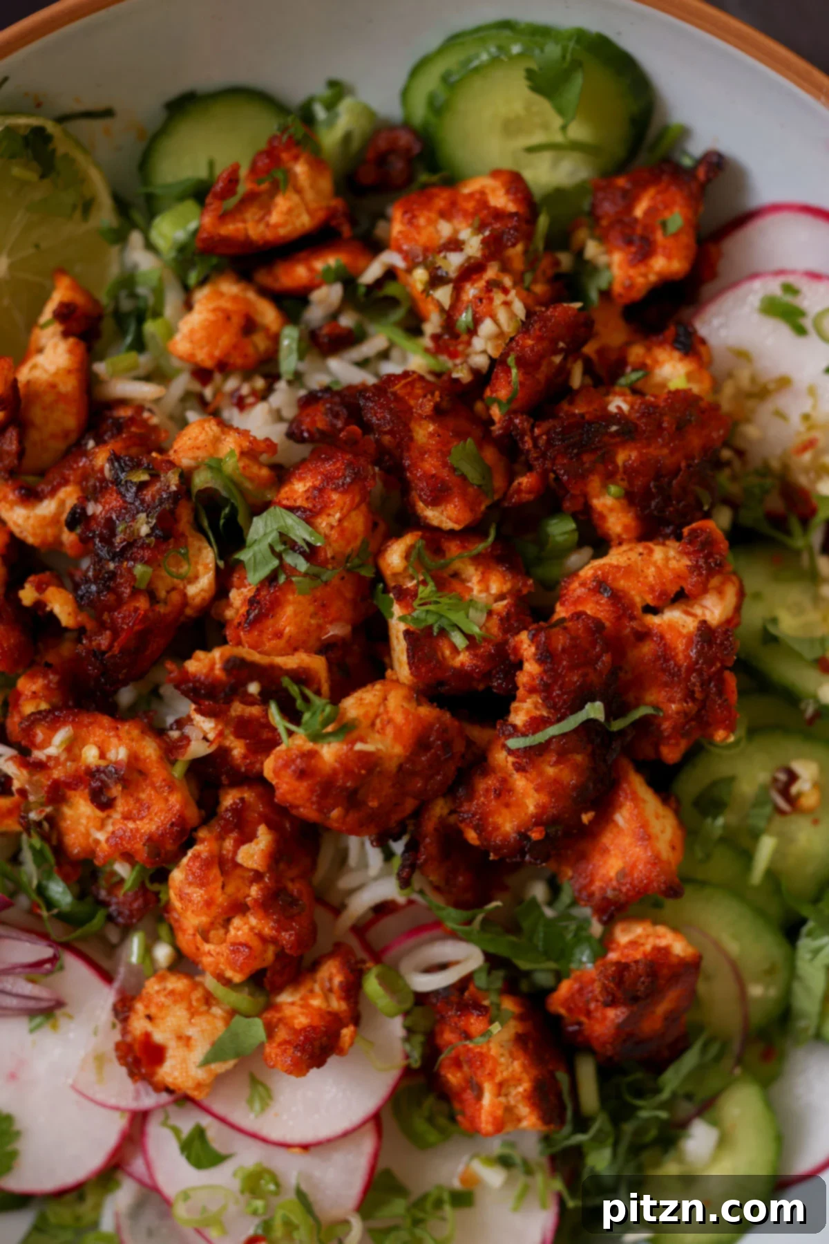 30-Minute Harissa Tofu Bowls for All Diets 5 close-up of harissa tofu in the bowl