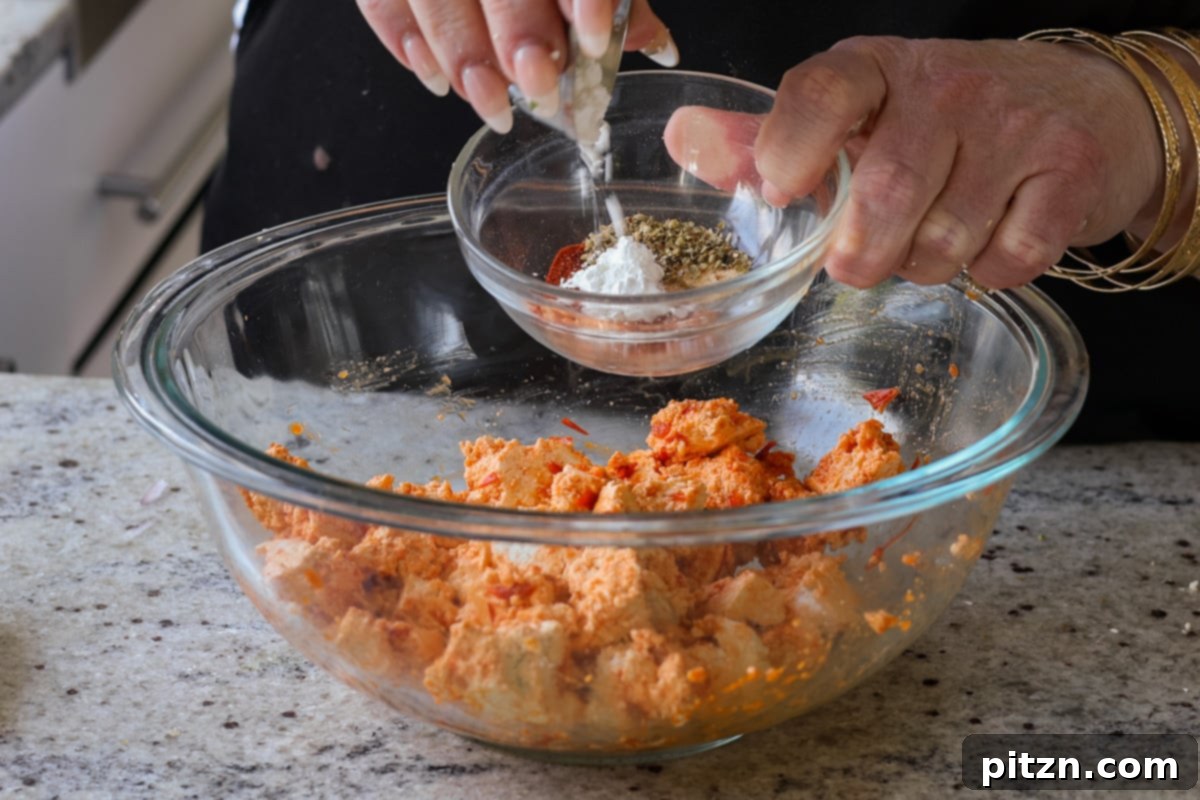 30-Minute Harissa Tofu Bowls for All Diets 9 mixing cornstarch and spices
