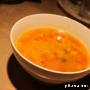 Daal Tadka served in a white bowl