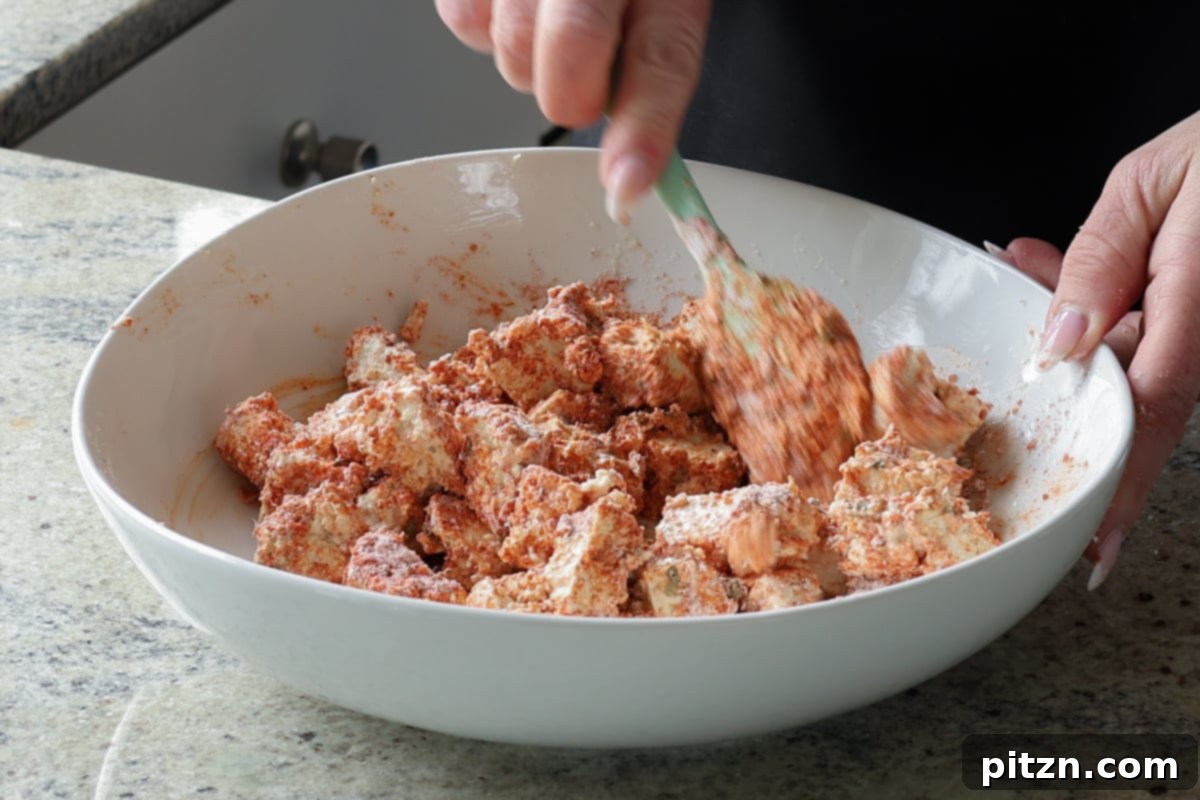 tofu after tossing in cornstarch and spices