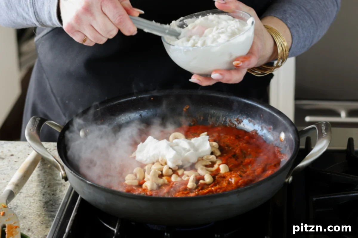 adding coconut cream to the pan
