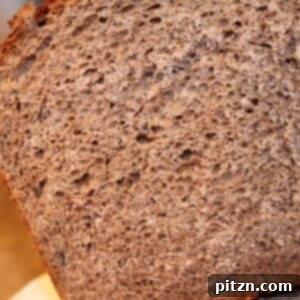 A loaf of indian gooseberry preserve wheat bread cut in half