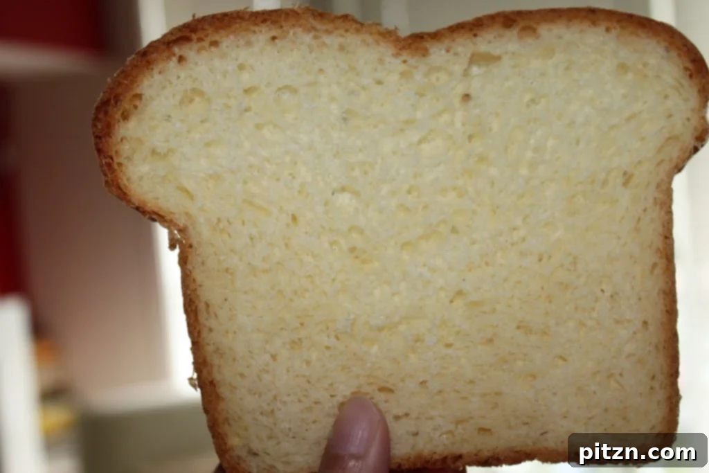 A super light and fluffy white sandwich loaf. Great for everyday sandwiches and toast. Simple and easy recipe. #veganricha