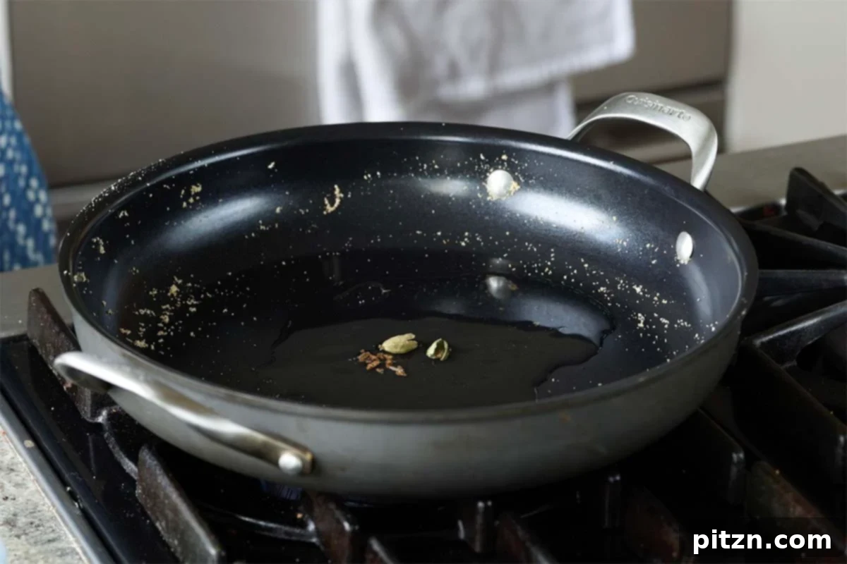 South Indian Soulmate Lentils 11 Fragrant toasted cardamom pods simmering in the pan.