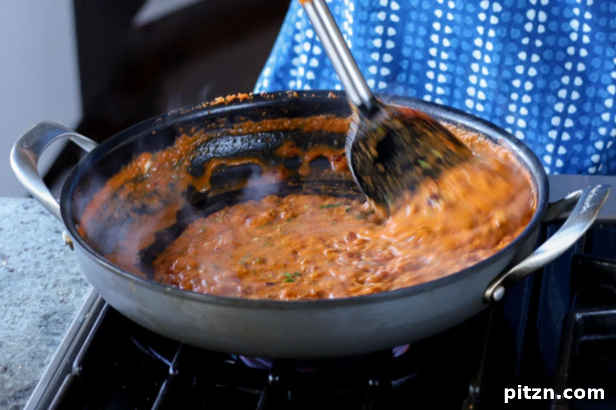 South Indian Soulmate Lentils 17 The fully cooked Marry Me Lentil sauce, rich and bubbling in the pan.