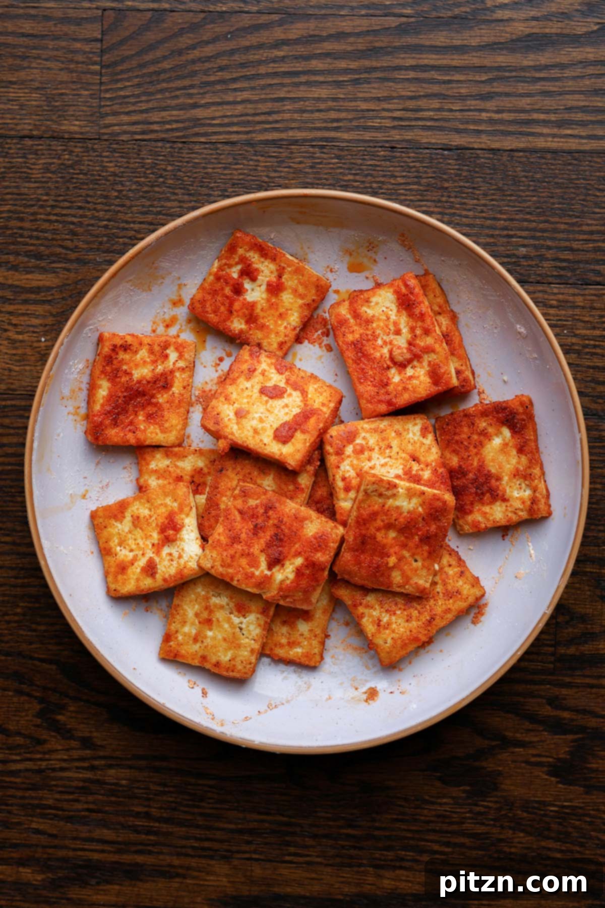 Crispy golden-brown tofu pieces, seasoned and ready to be added to the curry sauce