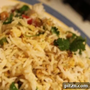 Royal Mughlai Vegetable Biryani 2 A close up of a plate of mughlai veggie biryani