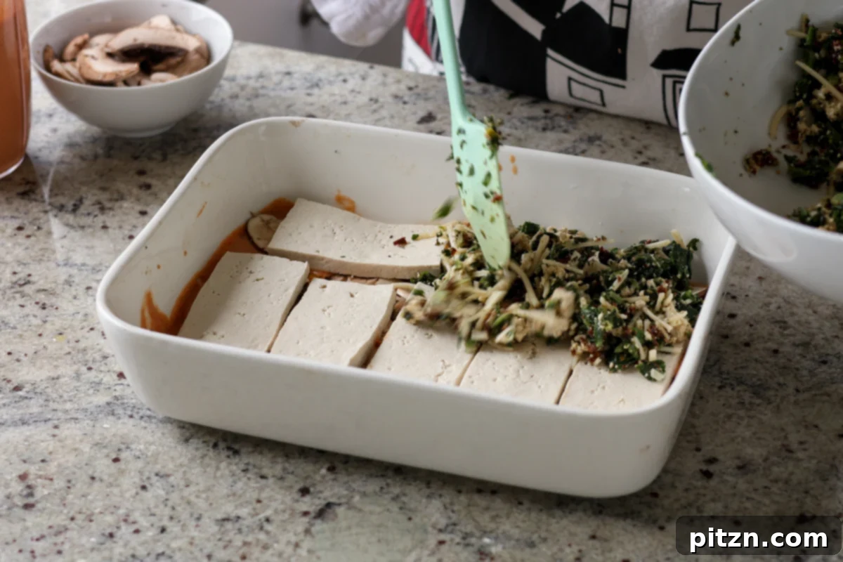 Marry Me Tofu Lasagna Bake 18 layering on the spinach filling