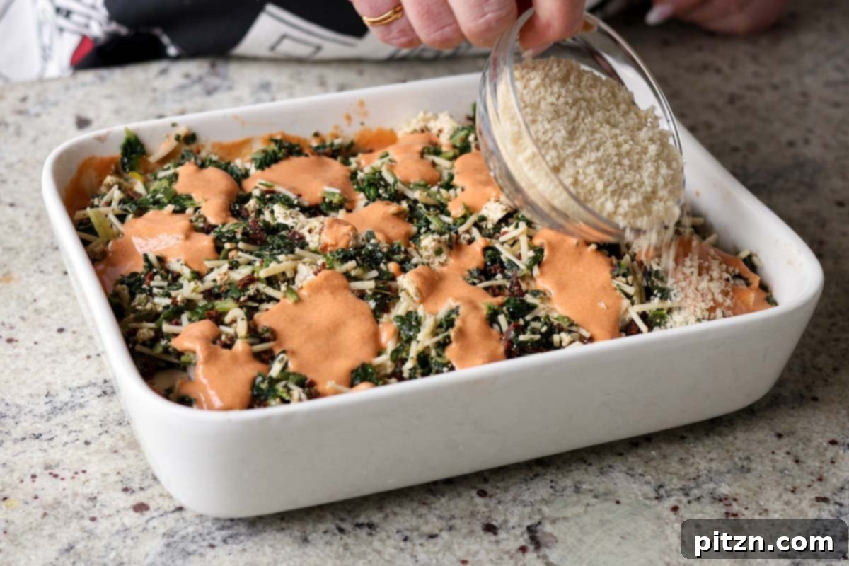 Marry Me Tofu Lasagna Bake 23 sprinkling on breadcrumbs
