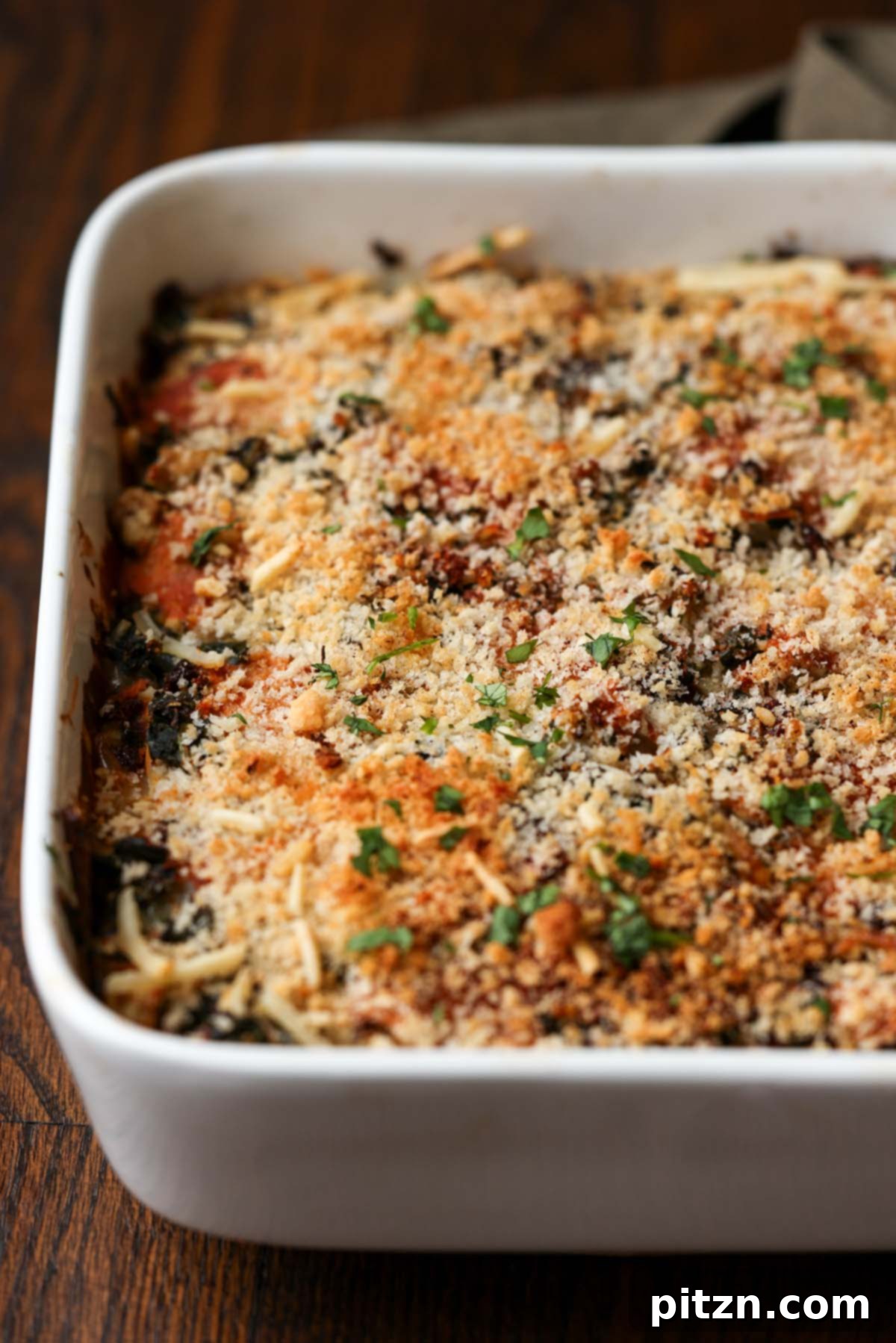 Marry Me Tofu Lasagna Bake 4 close-up of marry me tofu casserole in the pan after baking