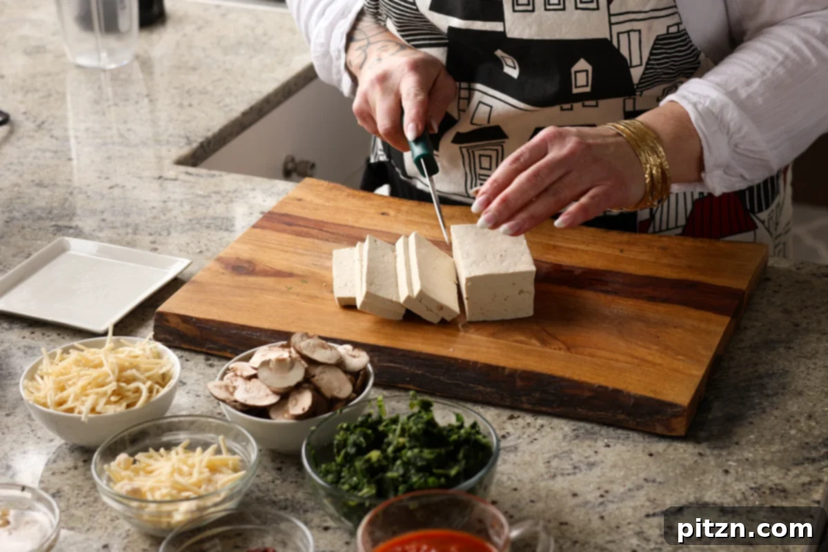 Marry Me Tofu Lasagna Bake 7 slicing the tofu
