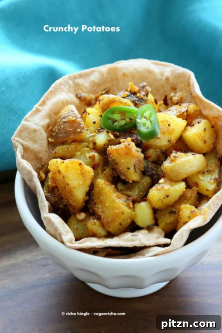 Golden Fiery Potato Crunch 2 Crunchy Spiced Indian Potatoes: A vibrant side dish or breakfast option.