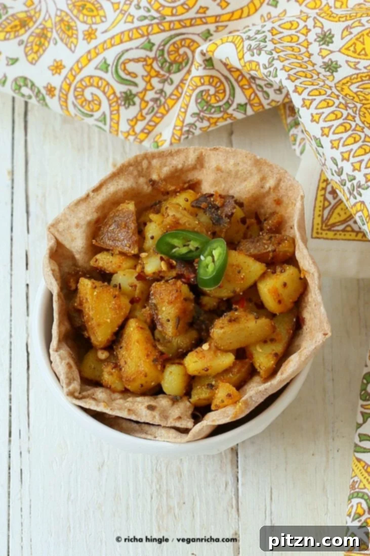 Golden Fiery Potato Crunch 3 Crispy pan-fried potatoes seasoned with aromatic Indian spices.