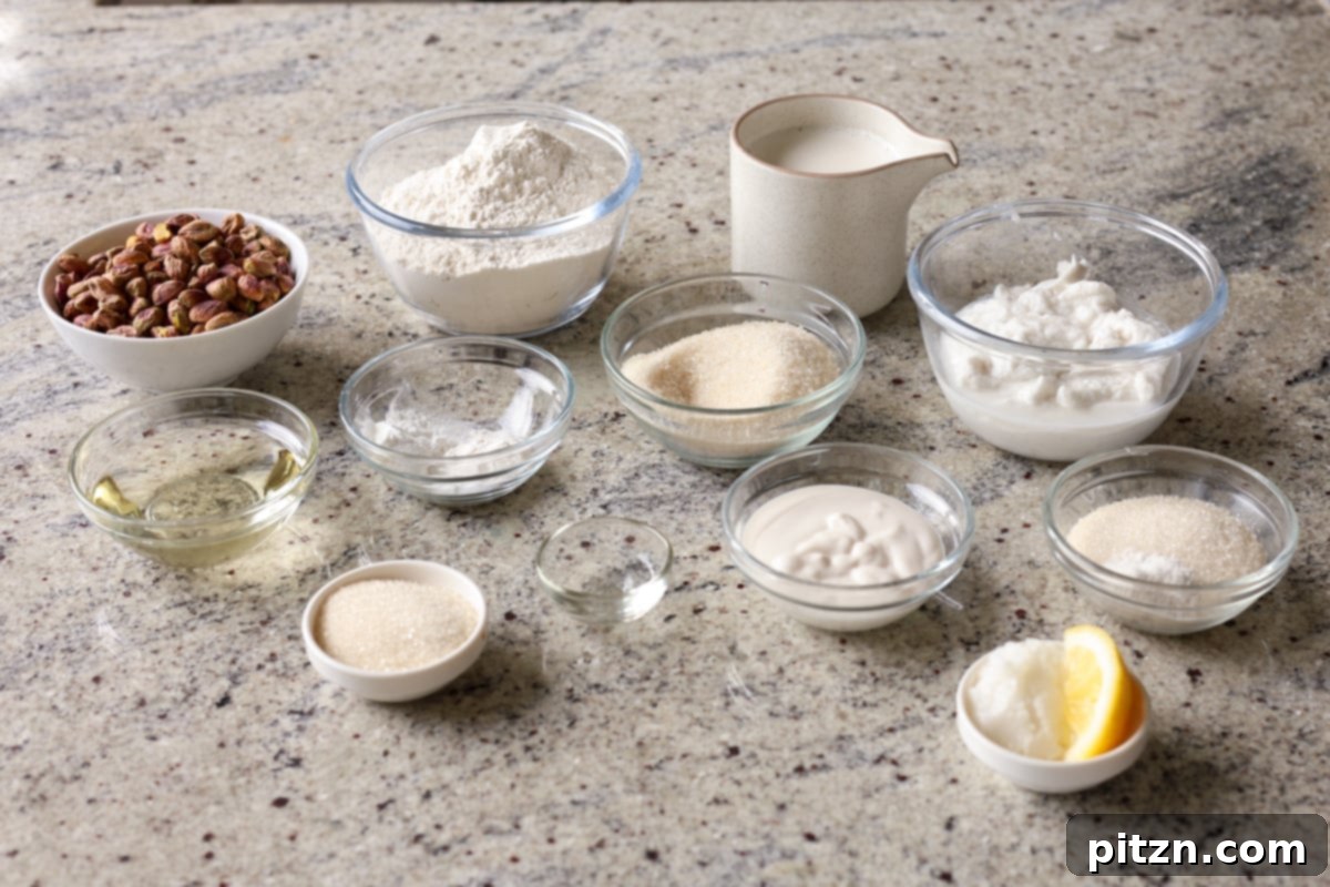 Pistachio Perfection Trio 8 A flat lay photograph showcasing all the fresh ingredients required for the triple pistachio cake, including shelled pistachios, flour, milk, and sugar.