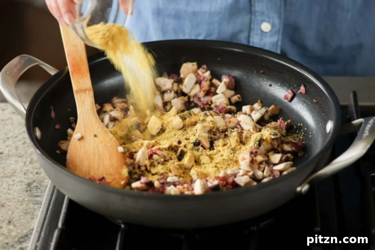 Zesty Mediterranean Butter Beans 10 adding mushrooms and nutritional yeast to the pan