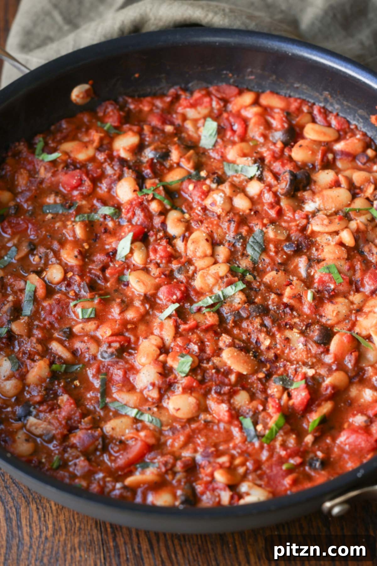 Zesty Mediterranean Butter Beans 3 close-up of puttanesca beans in the pan